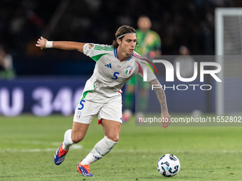 Riccardo Calafiori of Italy is in action during the UEFA Nations League 2024/25 League A Group A2 match between France and Italy at Parc des...