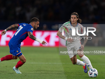 Riccardo Calafiori of Italy is in action during the UEFA Nations League 2024/25 League A Group A2 match between France and Italy at Parc des...