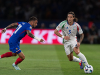 Riccardo Calafiori of Italy is in action during the UEFA Nations League 2024/25 League A Group A2 match between France and Italy at Parc des...