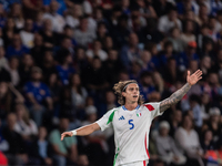 Riccardo Calafiori of Italy is in action during the UEFA Nations League 2024/25 League A Group A2 match between France and Italy at Parc des...