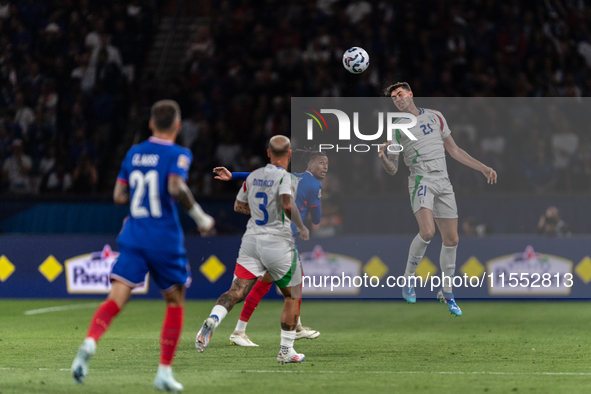 Alessandro Bastoni of Italy is in action during the UEFA Nations League 2024/25 League A Group A2 match between France and Italy at Parc des...