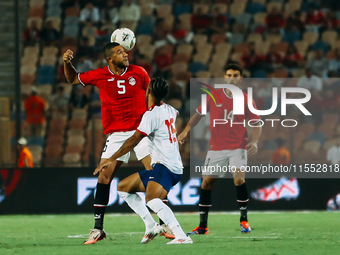 Egypt's Rami Rabia challenges Cape Verde's player during the 2025 Africa Cup of Nations Qualifiers Morocco match between Egypt and Cape Verd...