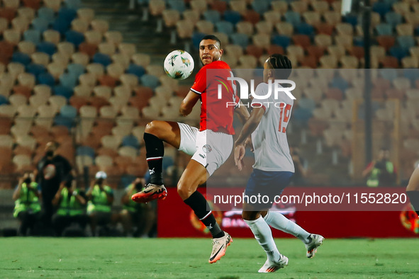 Egypt's Rami Rabia challenges Cape Verde's player during the 2025 Africa Cup of Nations Qualifiers Morocco match between Egypt and Cape Verd...