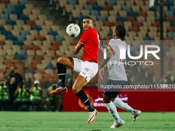 Egypt's Rami Rabia challenges Cape Verde's player during the 2025 Africa Cup of Nations Qualifiers Morocco match between Egypt and Cape Verd...