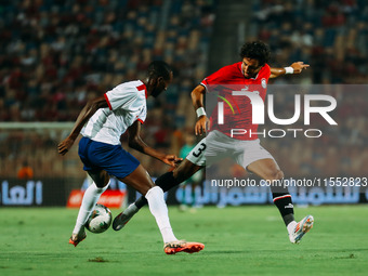 Egypt's Mohamed Hany challenges Cape Verde's player during the Egypt vs Cape Verde match in the 2025 Africa Cup of Nations Qualifiers Morocc...