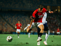 Egypt's Ahmed El Sayed Zizo challenges Cape Verde's player during the Egypt vs Cape Verde match in the 2025 Africa Cup of Nations Qualifiers...