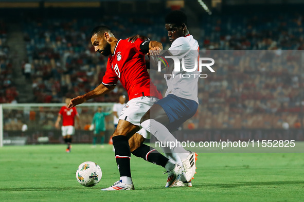 Mohamed Salah of Egypt challenges a Cape Verde player during the Egypt vs Cape Verde match in the 2025 Africa Cup of Nations Qualifiers Moro...