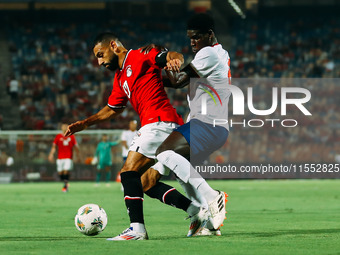 Mohamed Salah of Egypt challenges a Cape Verde player during the Egypt vs Cape Verde match in the 2025 Africa Cup of Nations Qualifiers Moro...