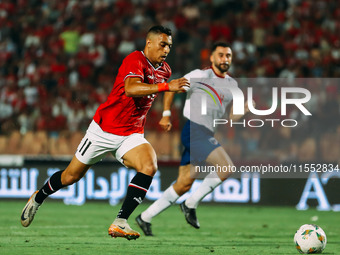 Egypt's Mostafa Mohamed challenges Cape Verde's player during the Egypt vs Cape Verde match in the 2025 Africa Cup of Nations Qualifiers Mor...