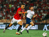 Egypt's Mostafa Mohamed challenges Cape Verde's player during the Egypt vs Cape Verde match in the 2025 Africa Cup of Nations Qualifiers Mor...