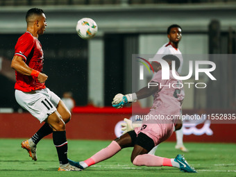 Egypt's Mostafa Mohamed challenges Cape Verde's player during the Egypt vs Cape Verde match in the 2025 Africa Cup of Nations Qualifiers Mor...