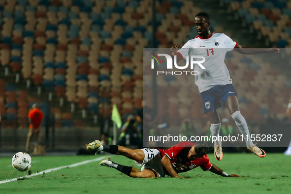 Egypt's Ahmed El Sayed Zizo challenges Cape Verde's player during the Egypt vs Cape Verde match in the 2025 Africa Cup of Nations Qualifiers...