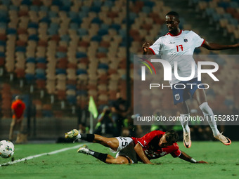 Egypt's Ahmed El Sayed Zizo challenges Cape Verde's player during the Egypt vs Cape Verde match in the 2025 Africa Cup of Nations Qualifiers...