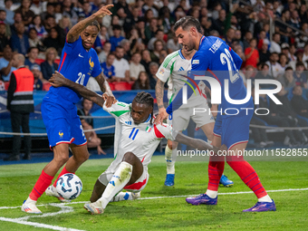 Moise Kean of Italy is in action during the UEFA Nations League 2024/25 League A Group A2 match between France and Italy at Parc des Princes...