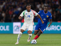 Destiny Udogie of Italy is in action during the UEFA Nations League 2024/25 League A Group A2 match between France and Italy at Parc des Pri...