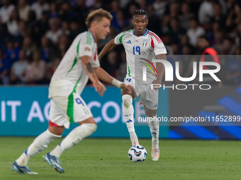 Destiny Udogie of Italy is in action during the UEFA Nations League 2024/25 League A Group A2 match between France and Italy at Parc des Pri...