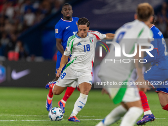 Giacomo Raspadori of Italy is in action during the UEFA Nations League 2024/25 League A Group A2 match between France and Italy at Parc des...