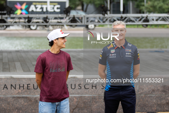 Red Bull Junior Driver Arvid Lindblad laughs between press photos as former Formula 1 driver David Coulthard looks forward at a private prev...