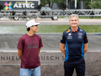 Red Bull Junior Driver Arvid Lindblad laughs between press photos as former Formula 1 driver David Coulthard looks forward at a private prev...