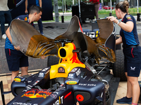 Red Bull engineers prepare the RB8 for engine revving at a private preview event for Red Bull's Houston Showrun in Houston, Texas, on Septem...