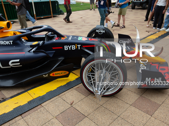 A Texas-themed F1 car outfitted with longhorn horns and ''slab'' wheels wows attendees at a private preview event for Red Bull's Houston Sho...