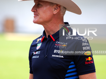 Former Formula 1 driver David Coulthard wears a cowboy hat at a private preview event for Red Bull's Houston Showrun in Houston, Texas, on S...