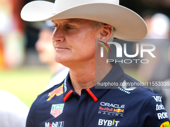 Former Formula 1 driver David Coulthard wears a cowboy hat at a private preview event for Red Bull's Houston Showrun in Houston, Texas, on S...