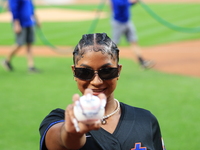 USA Olympic gymnast Jordan Chiles poses on the field to throw out the ceremonial first pitch before the baseball game between the Cincinnati...