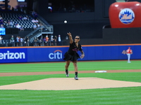 USA Olympic gymnast Jordan Chiles throws out the ceremonial first pitch before the baseball game between the Cincinnati Reds and New York Me...