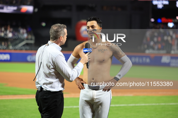 Mark Vientos #27 of the New York Mets is interviewed by SNY's Steve Gelbs after hitting a game-winning home run in the 10th inning to lift t...