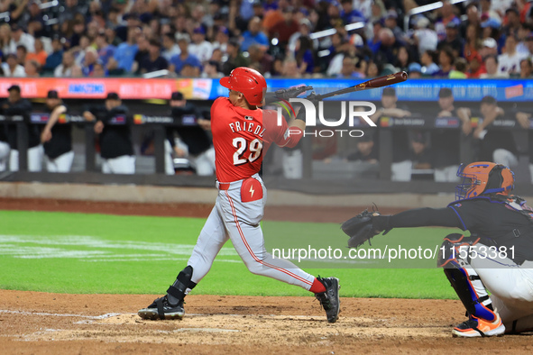 Cincinnati Reds' TJ Friedl #29 hits a two-run homer during the seventh inning of the baseball game against the New York Mets at Citi Field i...