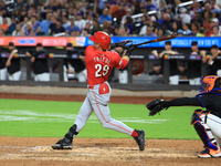 Cincinnati Reds' TJ Friedl #29 hits a two-run homer during the seventh inning of the baseball game against the New York Mets at Citi Field i...