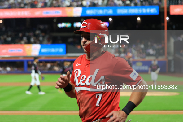 TJ Friedl #29 of the Cincinnati Reds is congratulated after hitting a two-run homer during the seventh inning of the baseball game against t...