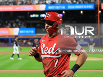 TJ Friedl #29 of the Cincinnati Reds is congratulated after hitting a two-run homer during the seventh inning of the baseball game against t...