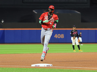 Cincinnati Reds' Elly De La Cruz #44 connects for a home run during the fourth inning of the baseball game against the New York Mets at Citi...