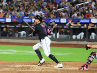 Brandon Nimmo #9 of the New York Mets singles during the seventh inning of the baseball game against the Cincinnati Reds at Citi Field in Co...