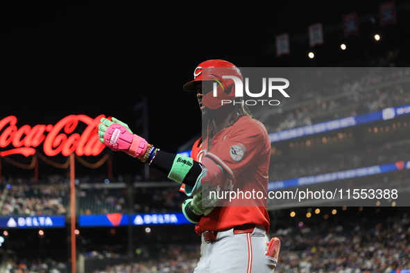 Cincinnati Reds' Elly De La Cruz #44 is congratulated after homering during the fourth inning of the baseball game against the New York Mets...