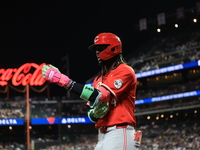 Cincinnati Reds' Elly De La Cruz #44 is congratulated after homering during the fourth inning of the baseball game against the New York Mets...