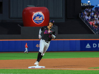 Mark Vientos #27 of the New York Mets homers during the first inning of the baseball game against the Cincinnati Reds at Citi Field in Coron...