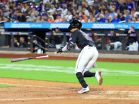 Mark Vientos #27 of the New York Mets singles during the seventh inning of the baseball game against the Cincinnati Reds at Citi Field in Co...