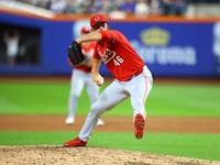 Cincinnati Reds pitcher Buck Farmer #46 throws during the sixth inning of the baseball game against the New York Mets at Citi Field in Coron...