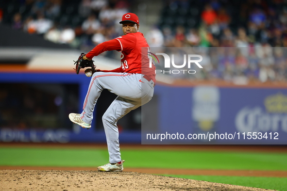 Cincinnati Reds pitcher Alexis Diaz #43 throws during the ninth inning of the baseball game against the New York Mets at Citi Field in Coron...