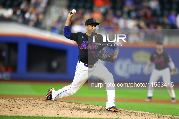 New York Mets relief pitcher Edwin Diaz #39 throws during the ninth inning of the baseball game against the Cincinnati Reds at Citi Field in...