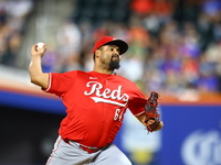 Cincinnati Reds pitcher Tony Santillan #64 throws during the eighth inning of the baseball game against the New York Mets at Citi Field in C...