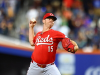 Cincinnati Reds pitcher Emilio Pagan #15 throws during the seventh inning of the baseball game against the New York Mets at Citi Field in Co...