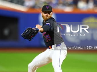 New York Mets relief pitcher Reed Garrett #75 throws during the seventh inning of the baseball game against the Cincinnati Reds at Citi Fiel...