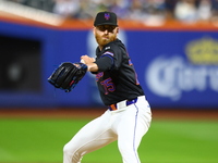 New York Mets relief pitcher Reed Garrett #75 throws during the seventh inning of the baseball game against the Cincinnati Reds at Citi Fiel...