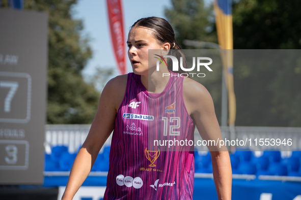 Wiktoria Keller participates in the LOTTO 3x3 League basketball game in Sosnowiec, Poland, on September 6, 2024. The Lotto 3x3 Liga tourname...