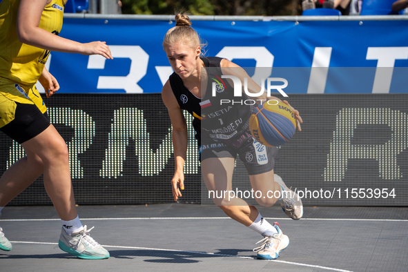 Kinga Dzierbicka participates in the LOTTO 3x3 League basketball game in Sosnowiec, Poland, on September 6, 2024. The Lotto 3x3 Liga tournam...