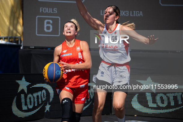 Barbara Lachacz and Oliwia Trzymkowska participate in the LOTTO 3x3 League basketball game in Sosnowiec, Poland, on September 6, 2024. The L...